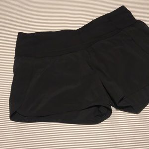 Lululemon mid-rise black running shorts